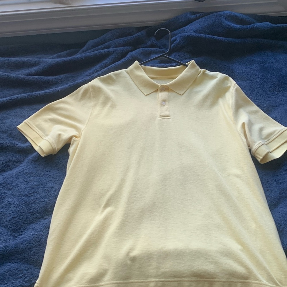 Yellow polo style shirt never worn but no tags